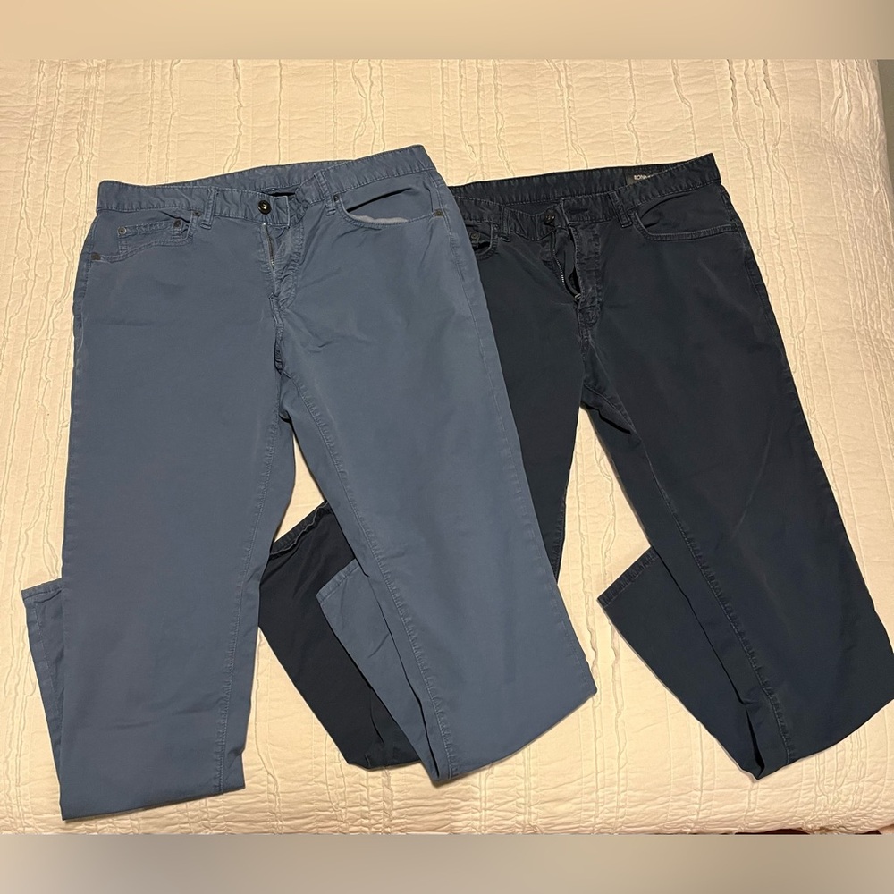 Men’s Bonobos pants. One pair light blue and the other dark blue. 33x32